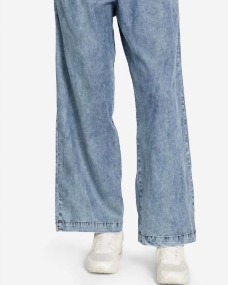 Front of a model wearing a size L Mabel Pants in Acid Denim in Acid Denim by MICHAEL LAUREN. | dia_product_style_image_id:338321